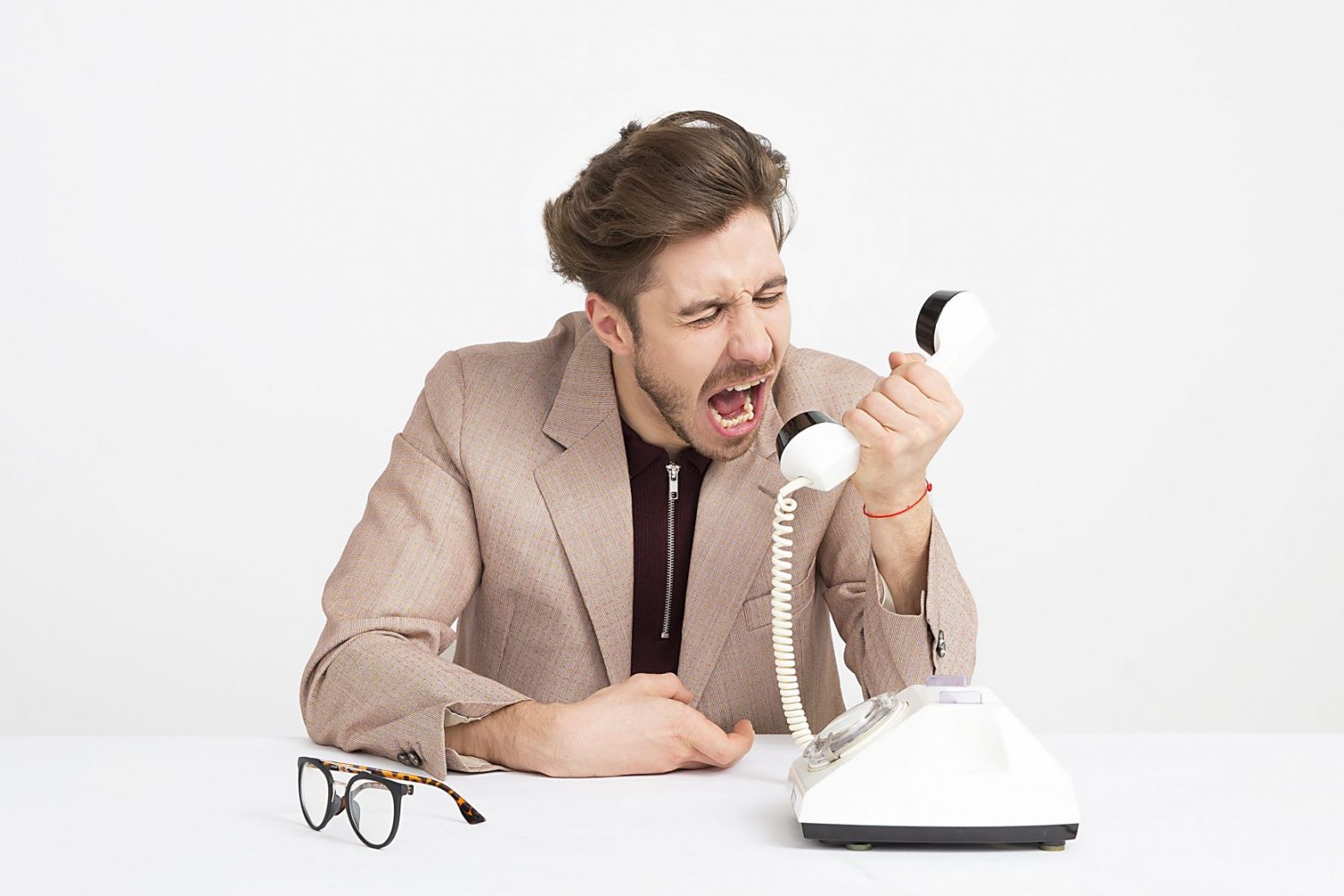 Angry man in a telephone call